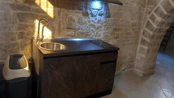 Fridge, coffee/tea maker, cookware/dishes/utensils