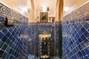 Shower, hair dryer, towels, toilet paper
