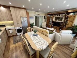 Apartment, 1 Bedroom, Smoking, Balcony | Dining room - Petőfi Downtown Apartment Stylish Comfort in Kecskemét's Heart (Kecskemet)