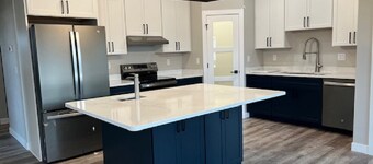 EAA 2 brand new 4-bed 3 bath, condo will be ready for EAA. Vehicle for rent too!