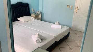 Standard Triple Room, Balcony, Pool View | In-room safe, soundproofing, free WiFi