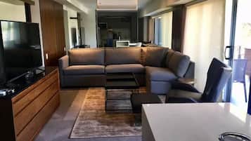 Apartamento, vista para a cidade | Área de estar