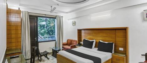 Signature Room | Living area | 32-inch LED TV with satellite channels