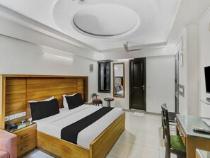 Signature Room | Living area | 32-inch LED TV with satellite channels