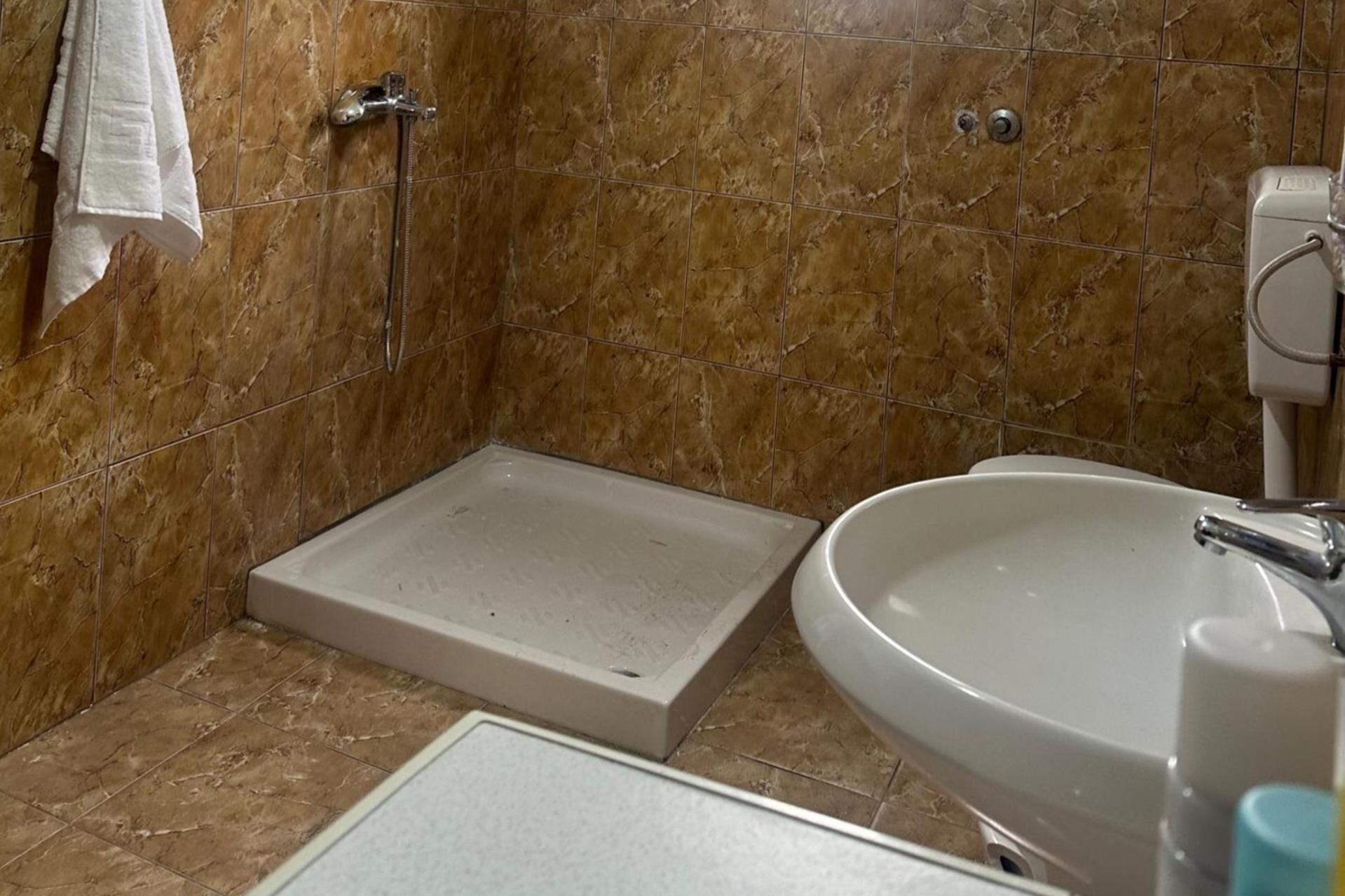 Hus | Bad | Dusj og håndklær