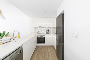 Réfrigérateur, four, plaque de cuisson, lave-vaisselle