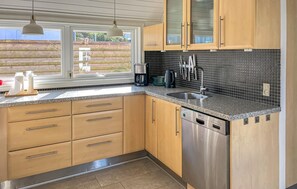 Fridge, dishwasher, coffee/tea maker