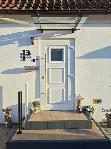 Frisch sanierte Ferienwohnung mit eigenem Garten