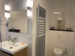 Hair dryer, bidet, towels, toilet paper