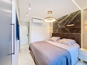 2 dormitorios, tabla de planchar con plancha, wifi y ropa de cama