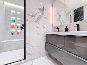 Hair dryer, towels, soap, toilet paper