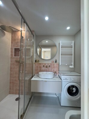 Hair dryer, towels, soap, toilet paper