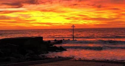 Cosy Seaside Apartment in old stone cottage, steps from the beach.