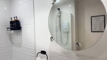 Hair dryer, towels, soap, shampoo