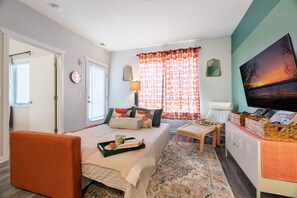 1 bedroom, desk, iron/ironing board, travel crib