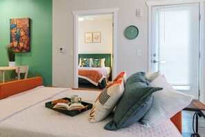 1 bedroom, desk, iron/ironing board, travel cot