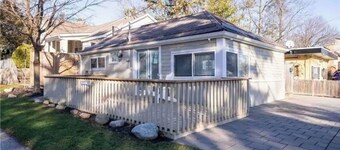 Cozy Grand Bend Cottage steps to the beach and the main strip with large deck!