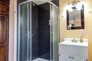 Shower, hair dryer, towels, soap