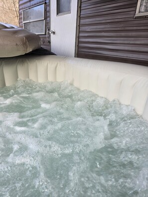 Outdoor spa tub - Cozy cabin in peaceful Glouster with WiFi, AC,  Very Quiet in a beautiful area. (Glouster)