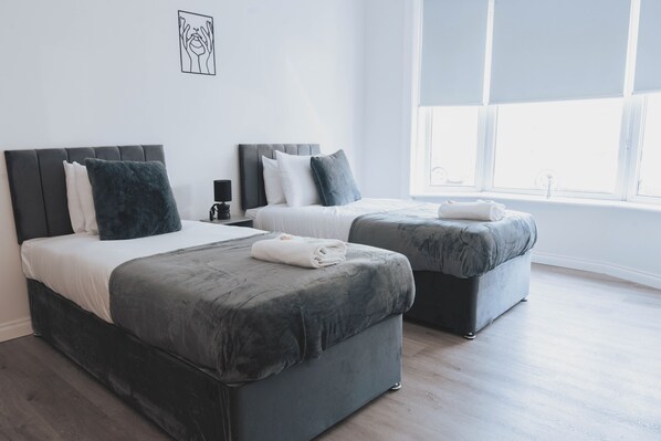 3 chambres, fer et planche à repasser, Wi-Fi, draps fournis