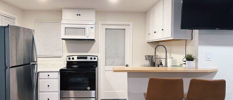 Microondas, horno y parrilla de estufa