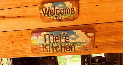 Mel’s Botanical Retreat “Blue Mahoe” Cottage