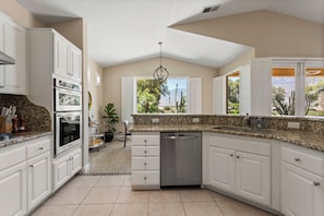 Coffee/tea maker, fridge, microwave, oven