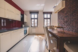 Fridge, microwave, cookware/dishes/utensils