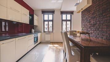 Fridge, microwave, cookware/dishes/utensils