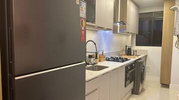Luxury Apartment, Pool View | Private kitchen | Espresso maker, coffee/tea maker, electric kettle