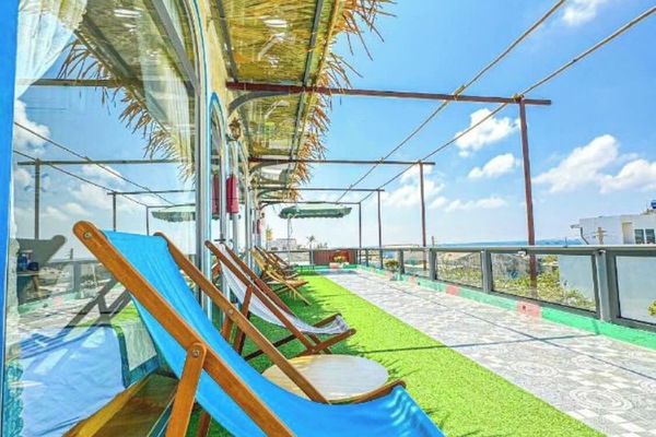 Deluxe Double Room, Beach View | Terrace/patio