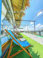 Deluxe Double Room, Beach View | Terrace/patio