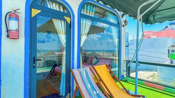 Deluxe Double Room, Beach View | Terrace/patio