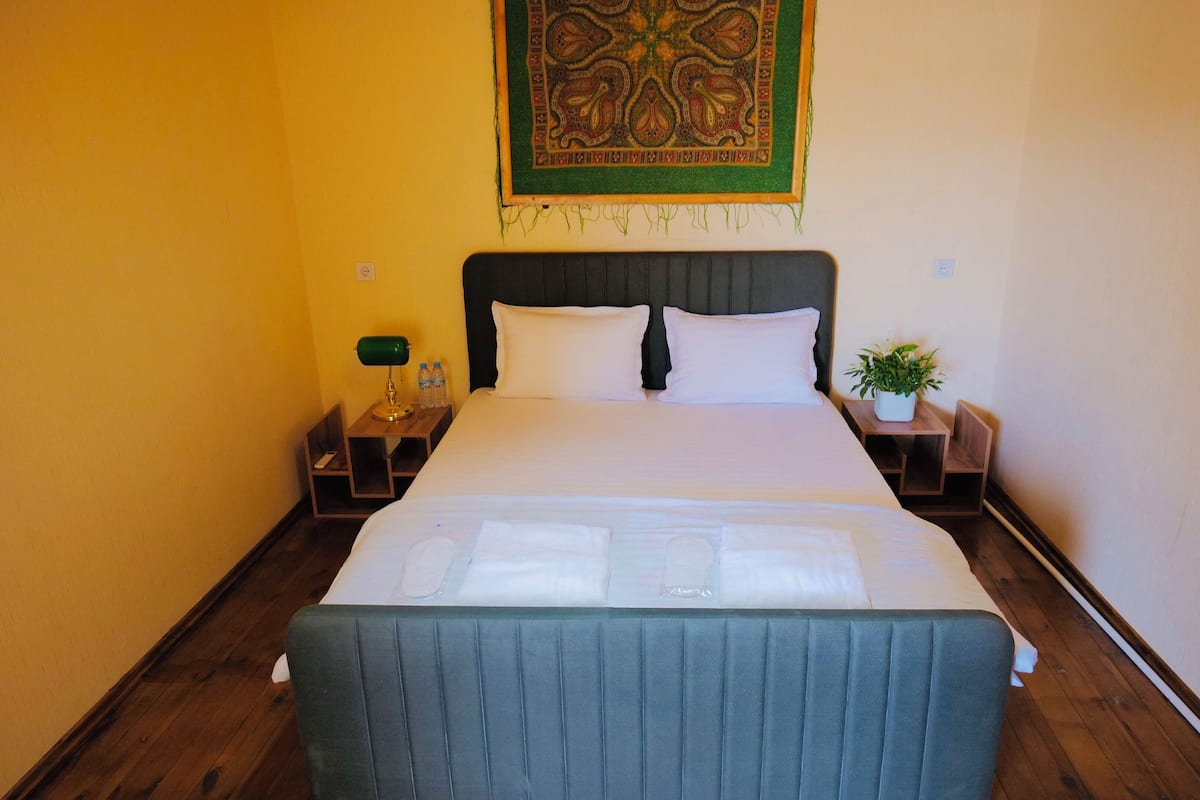 Egyptian cotton sheets, premium bedding, laptop workspace