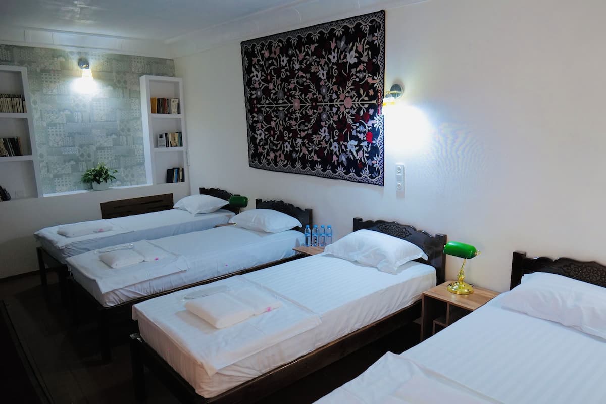 Egyptian cotton sheets, premium bedding, laptop workspace