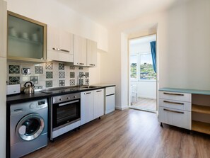 Fridge, oven, cookware/dishes/utensils