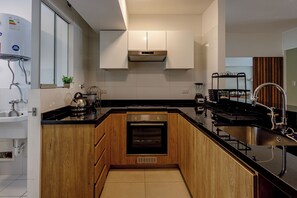 Fridge, microwave, oven, cookware/dishes/utensils