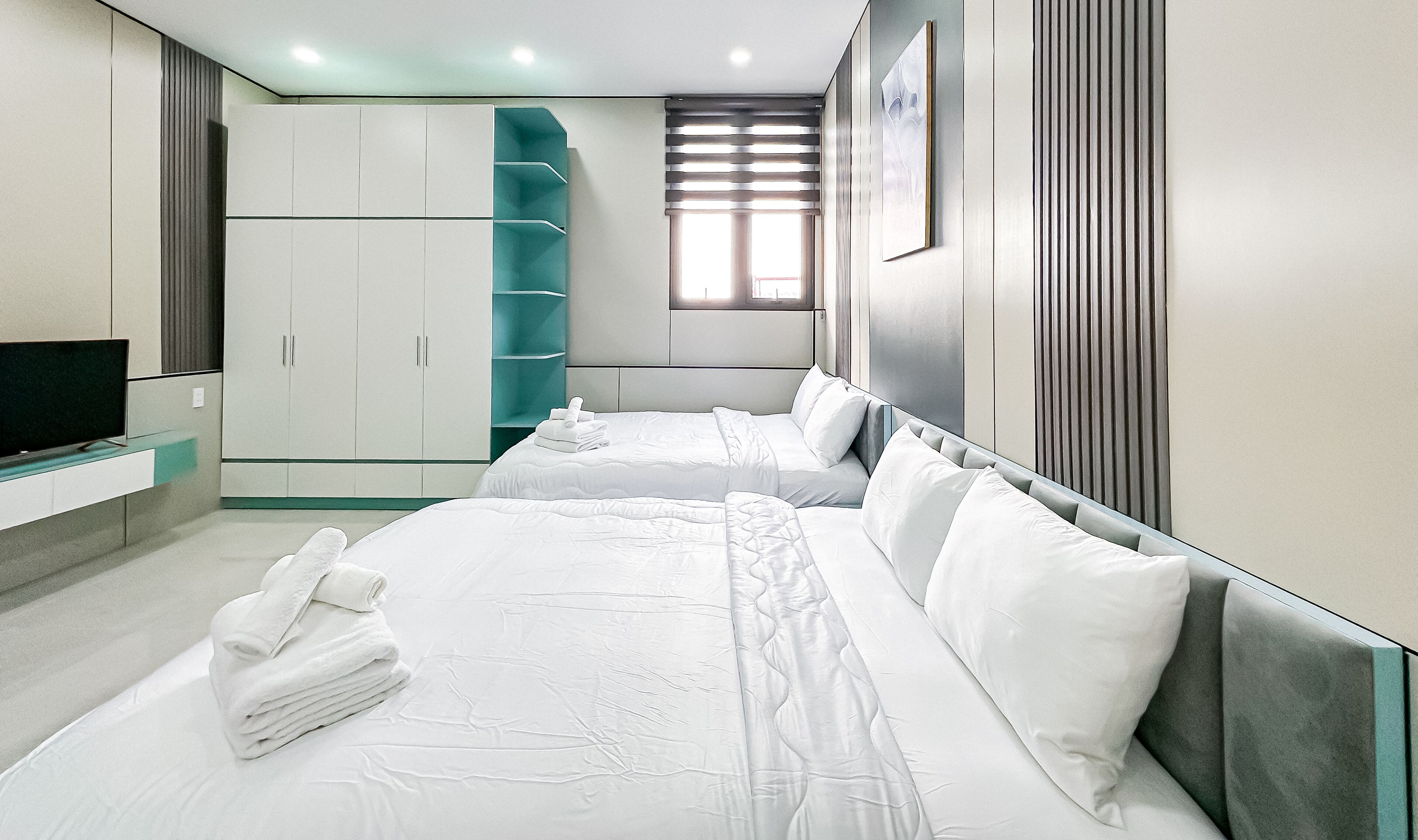 Family Suite, 2 Queen Beds, Ensuite, Garden View | Individually decorated, individually furnished, desk, laptop workspace