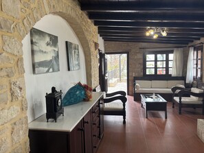 Basic Villa, Pool View | Living area | 32-inch Smart TV with cable channels, fireplace - Melina Stone Villa (Roumelí)