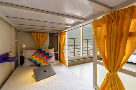 Bed in 6 Bed Mixed A/C Dormitory Room with Balcony and Ensuite Bathroom | Free WiFi