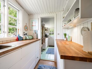 Fridge, microwave, dishwasher, cookware/dishes/utensils