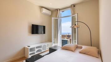 1 chambre, fer et planche à repasser, Wi-Fi gratuit, draps fournis