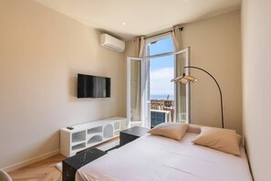 1 habitación, tabla de planchar con plancha, wifi gratis y ropa de cama 