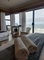 Family Triple Room, Ocean View | Iron/ironing board, WiFi (free)