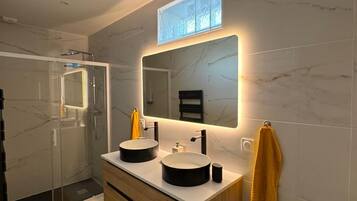 Shower, hair dryer, towels, soap