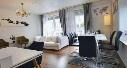 A cozy family home with a spacious garden next to a forest