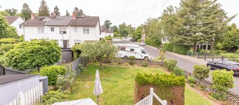 A cozy family home with a spacious garden next to a forest