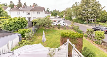 A cozy family home with a spacious garden next to a forest