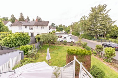 A cozy family home with a spacious garden next to a forest