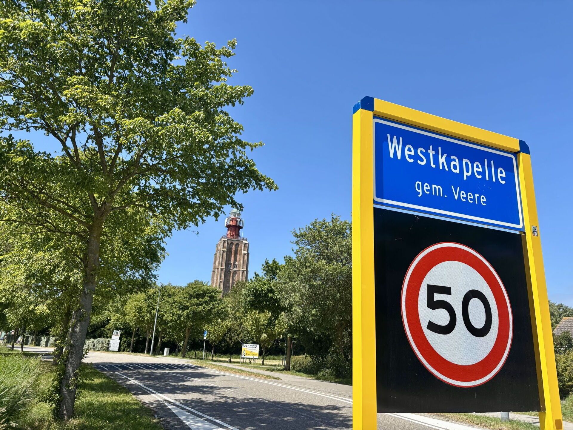A road sign indicating 'Westkapelle gem. Veere' with a speed limit of 50.